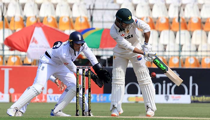 Pakistans Naseem Shah in action as Englands Jamie Smith reacts. — Reuters