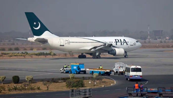 A Pakistan International Airlines (PIA) plane prepares to take-off at Alama Iqbal International Airport in Lahore February 1, 2012. — Reuters