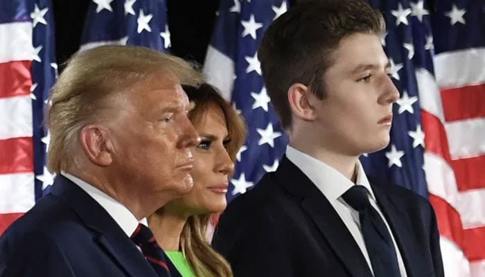 Former US president Donald Trump (left), former first lady Melania Trump (centre) and their son Barron Trump can be seen in this undated picture. — AFP/File