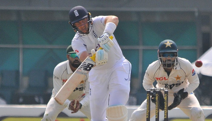 Englands Joe Root plays a shot on the third day of first Test at Multan Cricket Stadium on October 9, 2024. — PCB