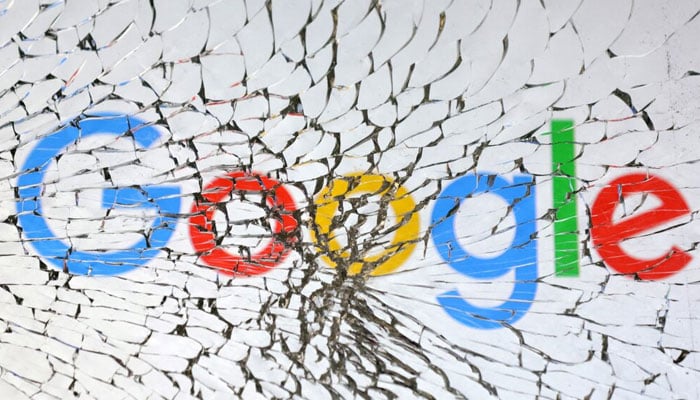 Google logo is seen through broken glass in this illustration taken, January 25, 2023. — Reuters