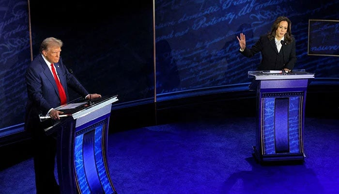 Democratic presidential nominee and US Vice President Kamala Harris, speaks during a presidential debate hosted by ABC as Republican presidential nominee, former US President Donald Trump, listens, in Philadelphia, Pennsylvania, US, September 10, 2024. — Reuters