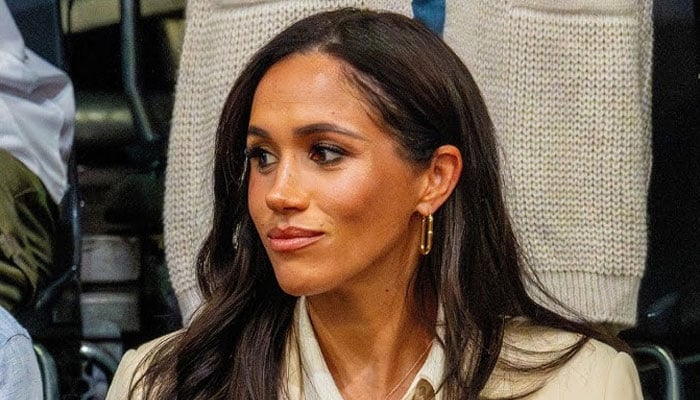 Meghan Markle turns shy and coy separated from Prince Harry