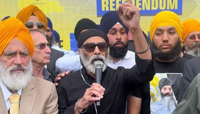 Pro-Khalistan Sikh leader and Sikhs For Justice (SFJ) General Counsel Gurpatwant Singh Pannun (centre), Indias most wanted man speaks during a protest rally. — Author