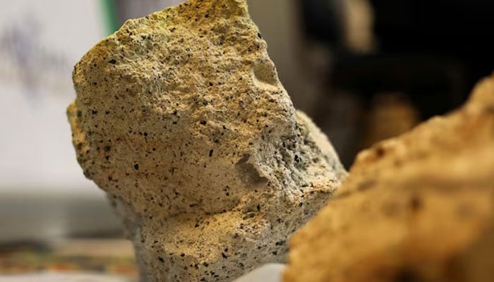 Uranium stone, a nuclear chemical element, is seen at a news conference of Macusani Yellowcake and Plateau Energy in Lima, Peru July 16, 2018. — Reuters