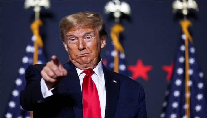 Republican presidential candidate and former US. President Donald Trump gestures at a campaign event ahead of the Republican presidential primary election in North Charleston, South Carolina, US. February 14, 2024. — Reuters