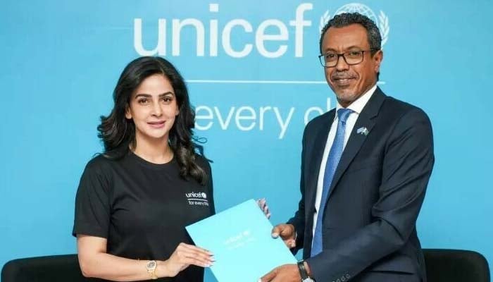 Actor Saba Qamar receives a certificate after her appointment as National Ambassador for Child Rights in Pakistan from the funds country representative Abdullah Fadil on Thursday. —Unicef