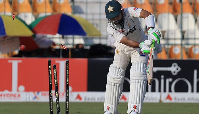 Pakistans Mohammad Rizwan is bowled by Englands Brydon Carse  on the fifth day of the first Test at Multan Cricket Stadium on October 11, 2024. — Reuters