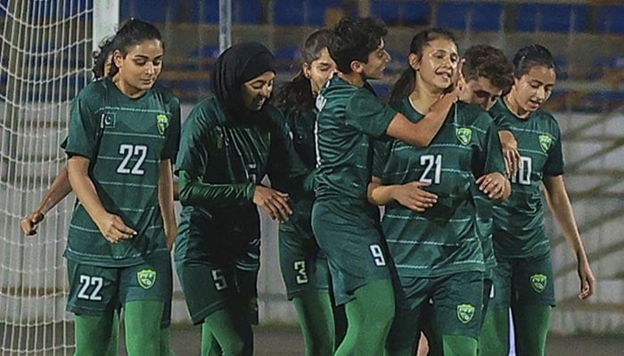 Pakistan womens team celebrates after scoring the winner against Tajikistan. — PFF/File