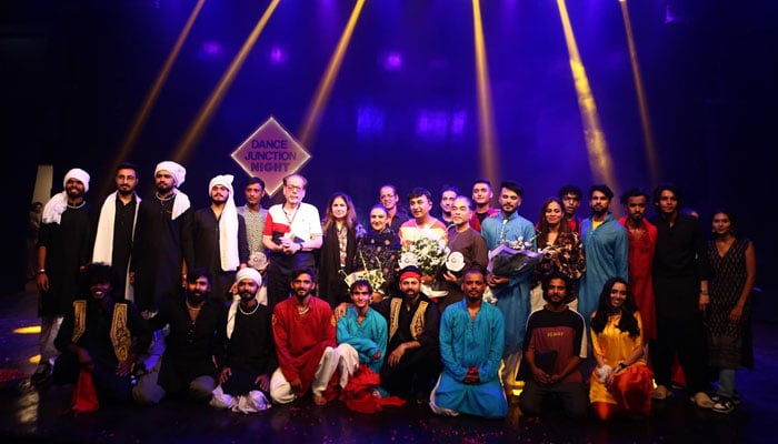 Performers pose for a group photo following their performance at the World Culture Festival at Arts Council of Pakistan (ACP) in Karachi on October 13, 2024. — Instagram/@acpkhiofficial