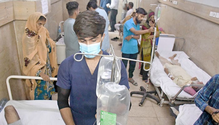 People receive medical treatment at a hospital in Karachi, Pakistan on June 25, 2024. — Online