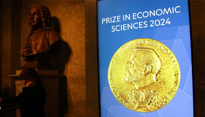 A view shows a screen in the Royal Swedish Academy of Sciences where the Nobel Prize in Economic Sciences is announced in Stockholm, Sweden, October 14, 2024. — Reuters