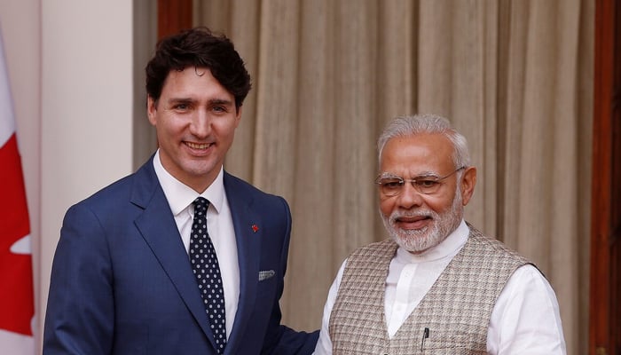 Canadian Prime Minister Justin Trudeau (L) shakes hands with his Indian counterpart Narendra Modi during a photo opportunity ahead of their meeting at Hyderabad House in New Delhi, India, February 23, 2018. — Reuters