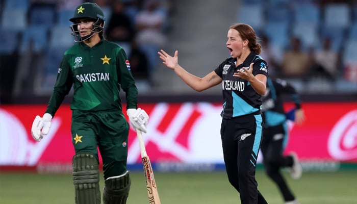 Pakistan women cricket teams batter returning to the dugout as Eden Carson of New Zealand celebrates a wicket during the Womens T20 World Cup 2024 at Dubai International Stadium on October 14, 2024. — ICC