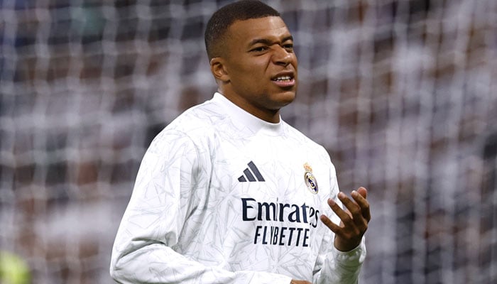 Real Madrids Kylian Mbappe during the warm up before the LaLiga match against Villarreal at Santiago Bernabeu in Madrid, Spain on October 5, 2024. — Reuters