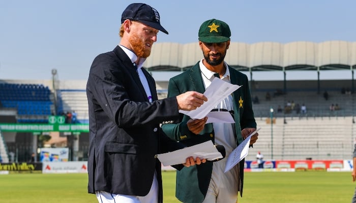 Pakistan skipper Shan Masood (right) with his England counterpart Ben Stokes at the Multan Cricket Stadium in Multan on October 15, 2024. —PCB