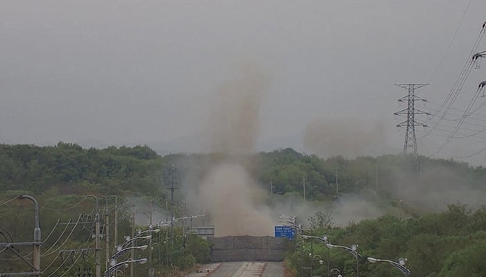 Smoke rises after North Korea blew up sections of inter-Korean roads on its side of the inter-Korean border, according to the South Korean military, as seen from the South Korean side, October 15, 2024. — Reuters