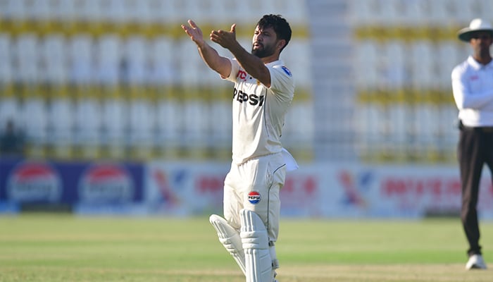 Pakistans Kamran Ghulam celebrates after scoring debut century during Day 1 of 2nd Test between Pakistan and England at Multan Cricket Stadium on October 15, 2024. — PCB