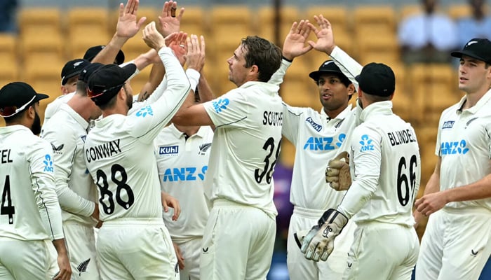 New Zealands players celebrate after the dismissal of Indias captain Rohit Sharma on October 17, 2024. — AFP