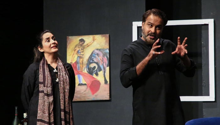 Plays director and actor Paras Masroor performs a scene with co-actor Sabreen Hisbani as his wife for theatre play Salgirah on October 17, 2024. — Facebook/Arts Council of Pakistan Karachi