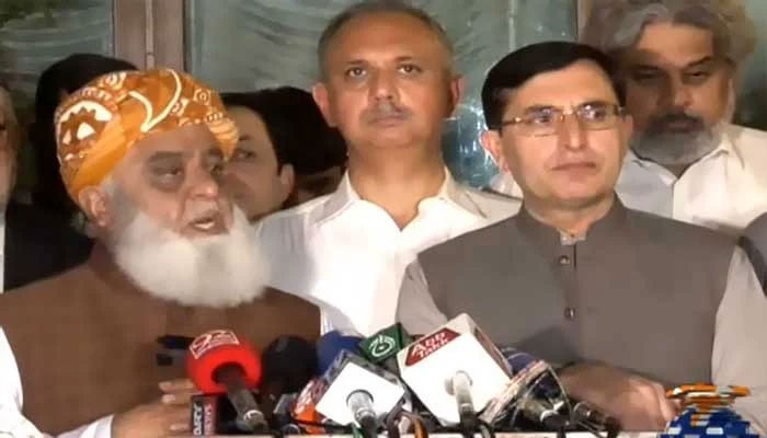 JUI-F chief Maulana Fazlur Rehman talking to the media along with PTI chairman Gohar Ali Khan in Islamabad on Oct 18, 2024. — Screengrab via YouTube/Geo News