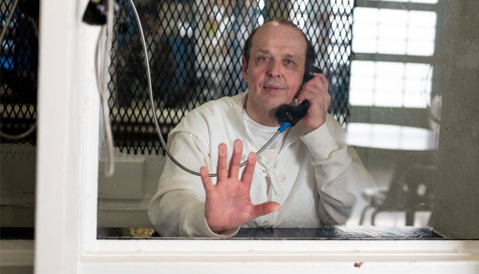 Robert Roberson can be seen through plexiglass at the Texas Department of Criminal Justice Polunsky Unit in Livingston, Texas, on December 19, 2023. — AFP