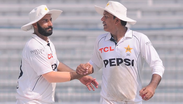 Pakistans Sajid Khan (left) and Noman Ali (right) celebrating during the match against England in Multan, on October 18, 2024. — PCB