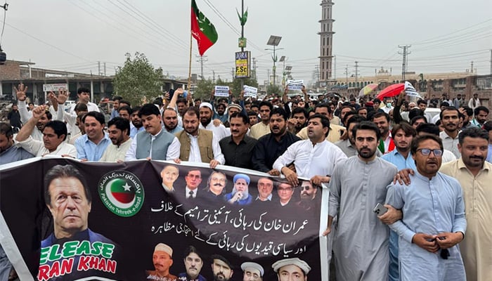 PTI workers stage the protest against constitutional amendment and party founder Imran Khans imprisonment in Khyber district, Khyber Pakhtunkhwa, on October 18, 2024. — X/@PTIofficial