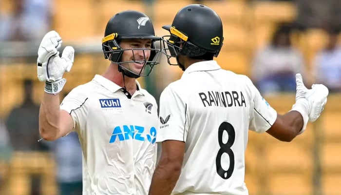 New Zealand players react after winning the first Test against India at Bengalurus M Chinnaswamy Stadium on October 20, 2024. — AFP