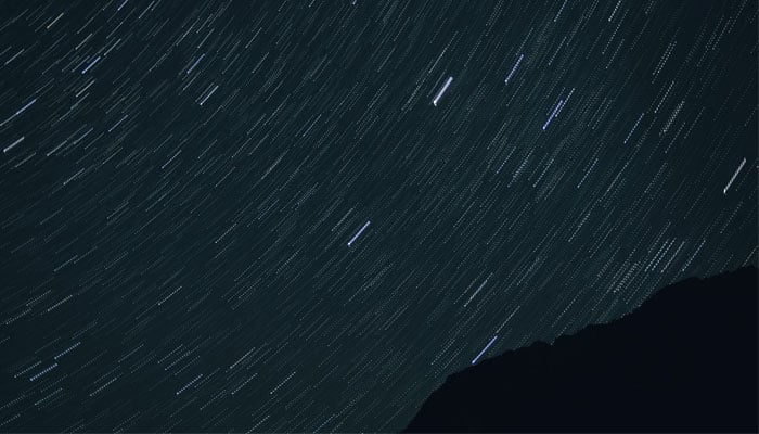 A representational images showing a meteor shower in the sky at night. — Unsplash