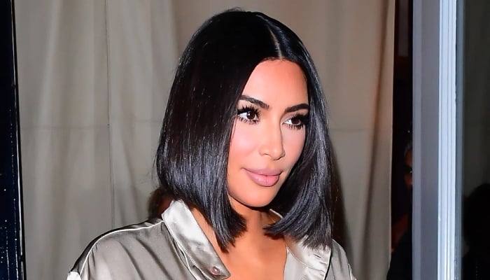 Photo: Kardashian sisters teasing Kim Kardashian over new look: Source