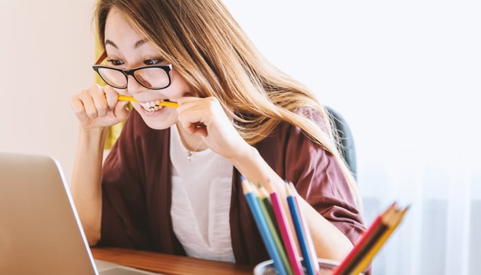 A representational image of a woman in stress at work. — Unsplash/File