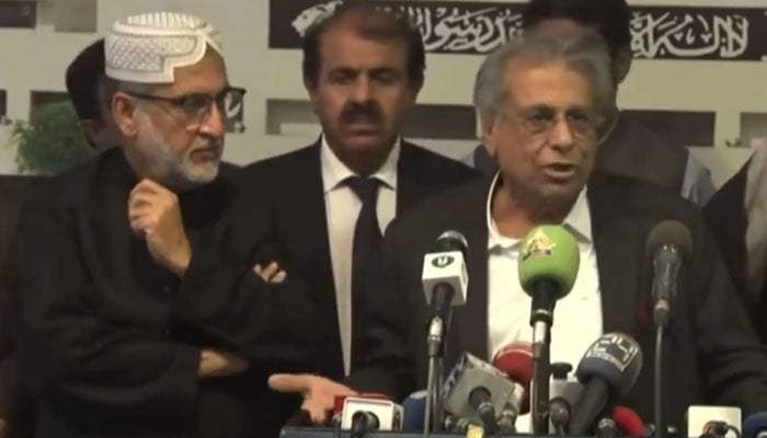 BNP-M Senator Qasim Roonjho (right) alongside party’s chief Akhtar Mengal addresses the press conference at Parliament House on October 22, 2024. — Screengrab via Geo News