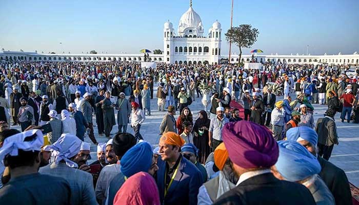 Sikh pilgrims visit the Shrine of Baba Guru Nanak Dev at Gurdwara Darbar Sahib in Kartarpur, near the Indian border, on November 9, 2019. — AFP