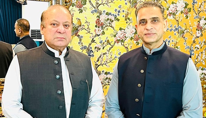 PML-N President Nawaz Sharif (left) and the partys UK chapter senior leader Zubair Gull. — Reporter