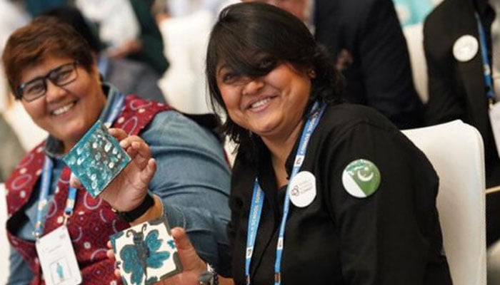 Pakistans Sadia Sheikh (left) and Naila Sheikh pose for a photo at the World School Summit in Dubai. — Reporter