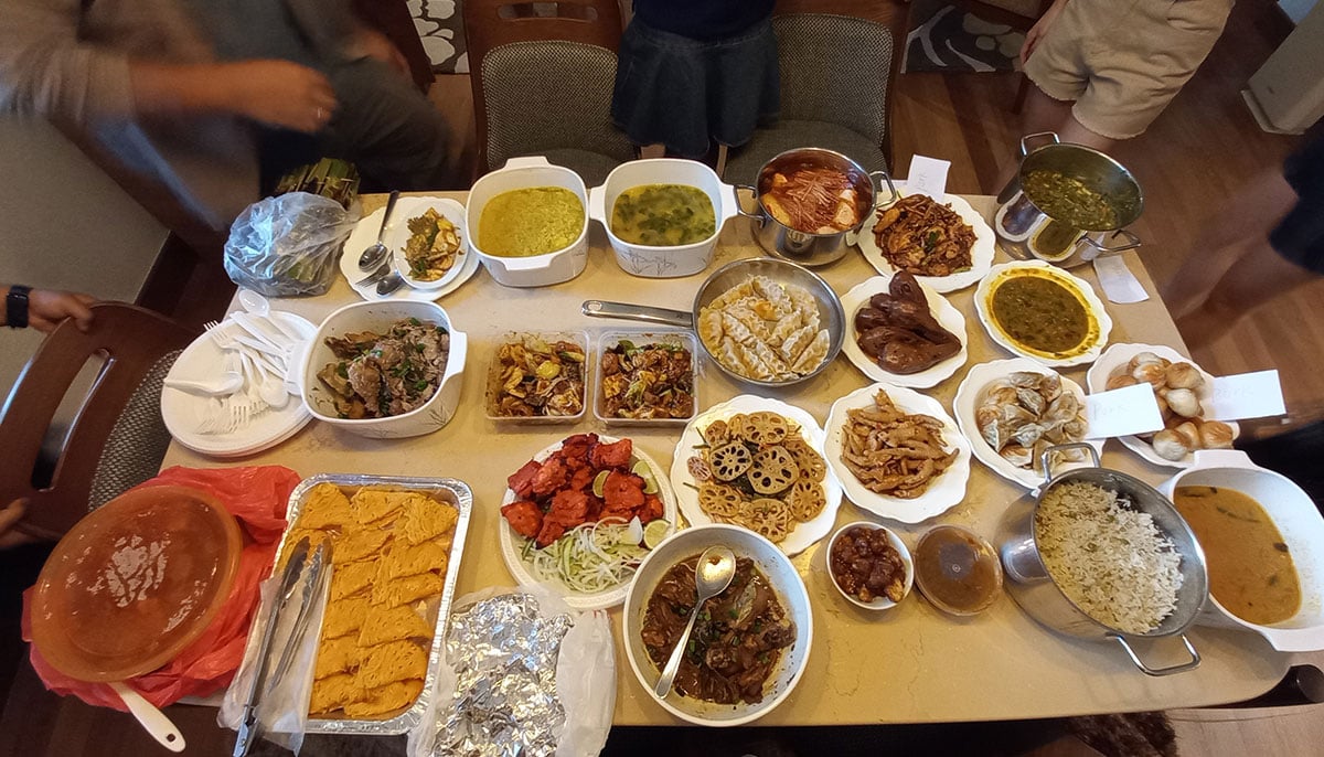 Potluck at AJF where all the fellows get to cook their local dishes. — Photo by author