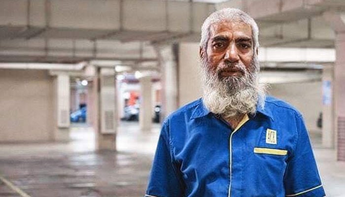 Abu Bakar, the 70-year-old cleaner at a mall in Klang. — Facebook/Al Buruj Press/File