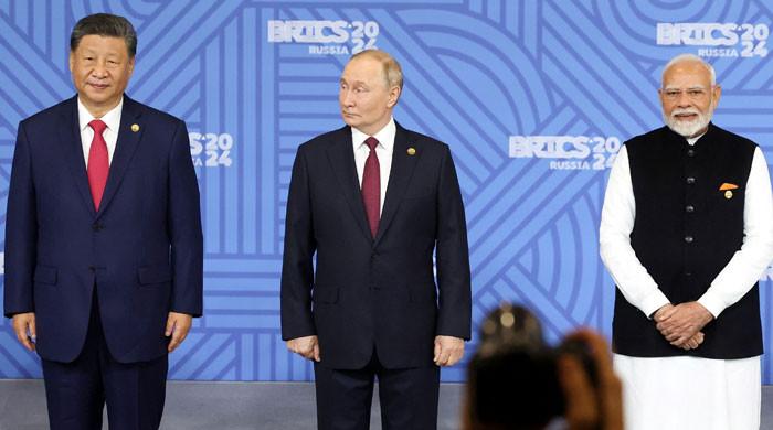 Putin scores BRICS win with rare Xi and Modi show of harmony