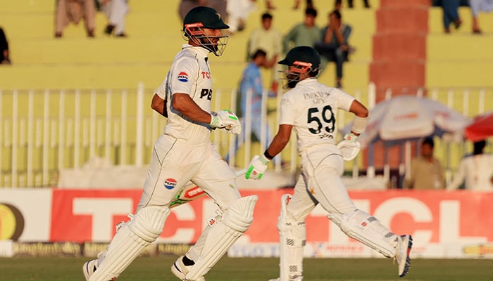 Pakistans Saud Shakeel and Shan Masood in action running between the wickets against England on October 24, 2024. — Reuters