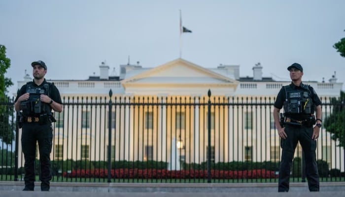 Members of the United States Secret Service Uniformed Division (USSS UD) stand guard outside the White House in Washington, U.S., July 13, 2024. — Reuters