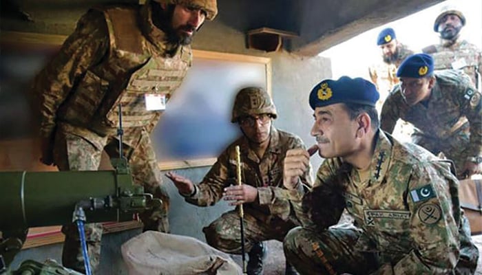 Chief of Army Staff General Syed Asim Munir meets troops in this undated photo. — ISPR