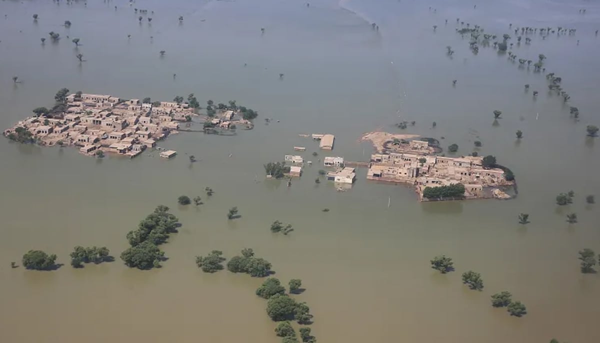 An aerial photograph taken on September 1, 2022 shows a flooded residential area in Sindhs Dadu district. — AFP