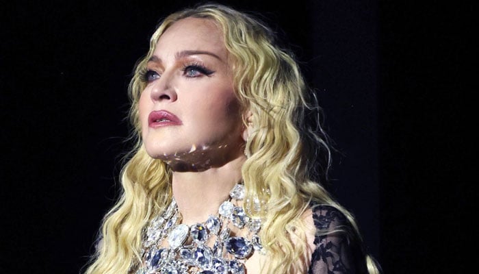 Madonna pays visit to late brother Christophers grave