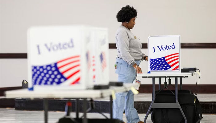 A woman votes at the Richland County Adult Activities Centre during the republican presidential primary in Columbia, South Carolina, US, February 24, 2024. — Reuters