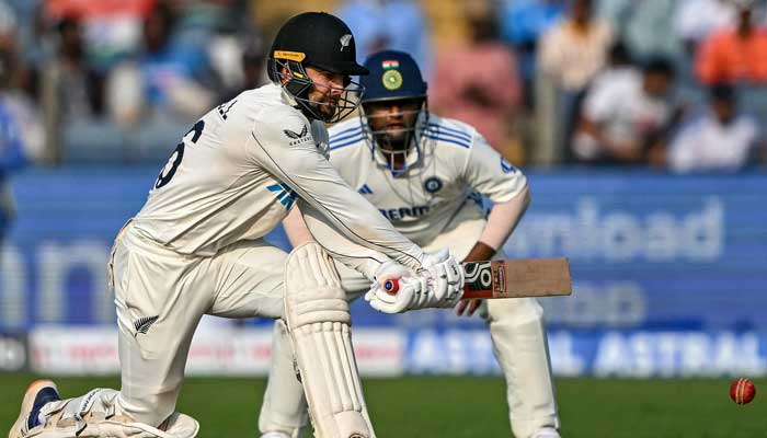 New Zealand´s Tom Blundell (left) plays a shot during the second day of the second Test cricket match between India and New Zealand at the Maharashtra Cricket Association Stadium in Pune on October 25, 2024. — AFP