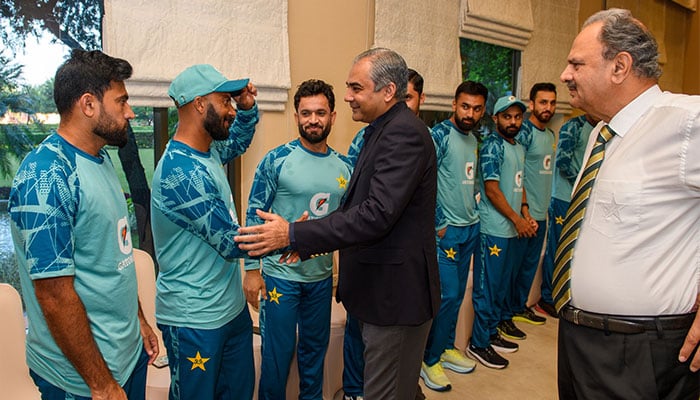 PCB Chairman Mohsin Naqvi shakes hands with Sajid Khan while meeting team players after Pakistan’s home series win against England on October 26, 2024. — Facebook/@PakistanCricketBoard