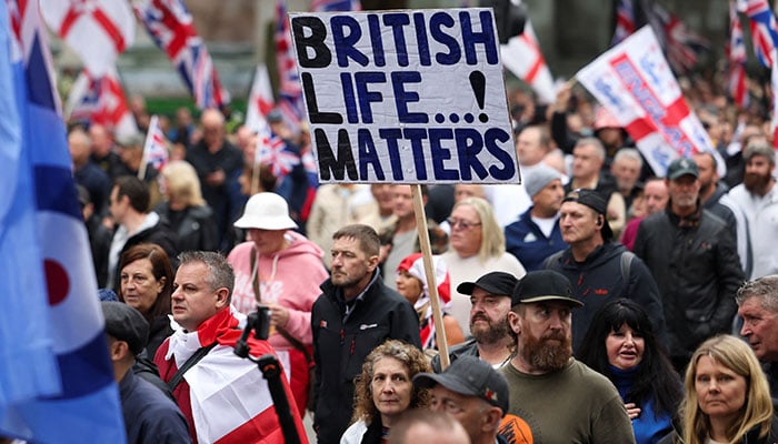 People attend an anti-immigration protest, in London, Britain on October 26, 2024. — Reuters