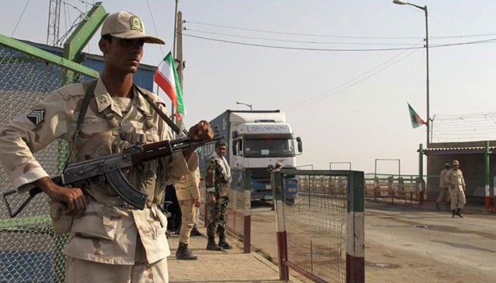 An undated image showing Iranian soldiers keep watch at a drug trafficking patrol post in Milak, southeastern Iran, near the Afghan border. — AFP/File