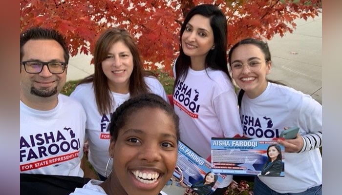 Pakistani American Democrat Ayesha Farooqi (second right) appears with her supporters. - Farooqifor57.com